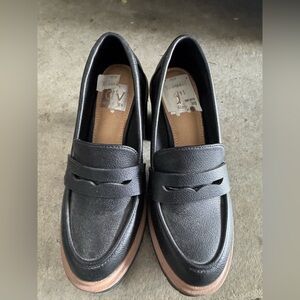 Classic Black Loafers with Brown Sole